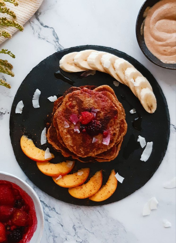Wholesome vegan protein pancakes with RED LENTILs served with fruits on a platter
